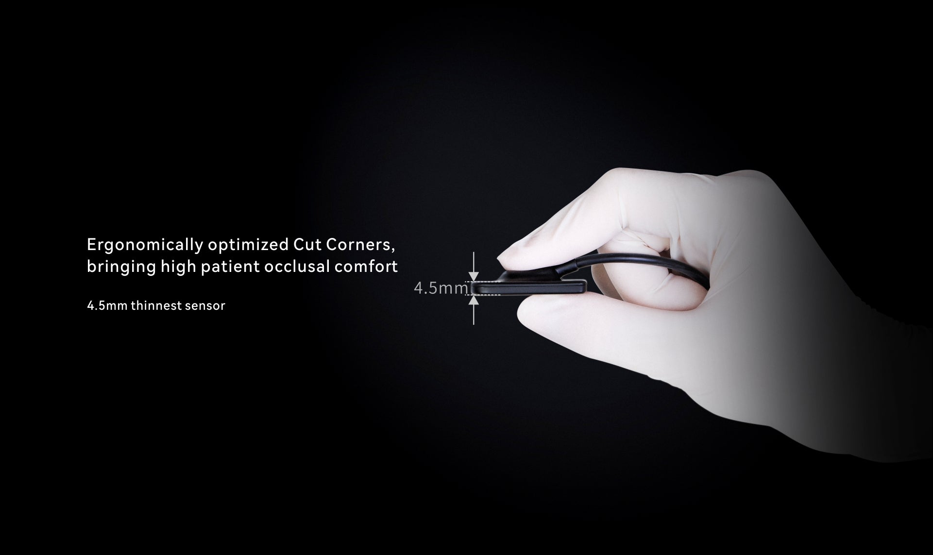 Gloved hand holding the ultra-thin 4.5mm i-Sensor, demonstrating its ergonomic design with optimized corners for improved patient comfort during dental imaging.