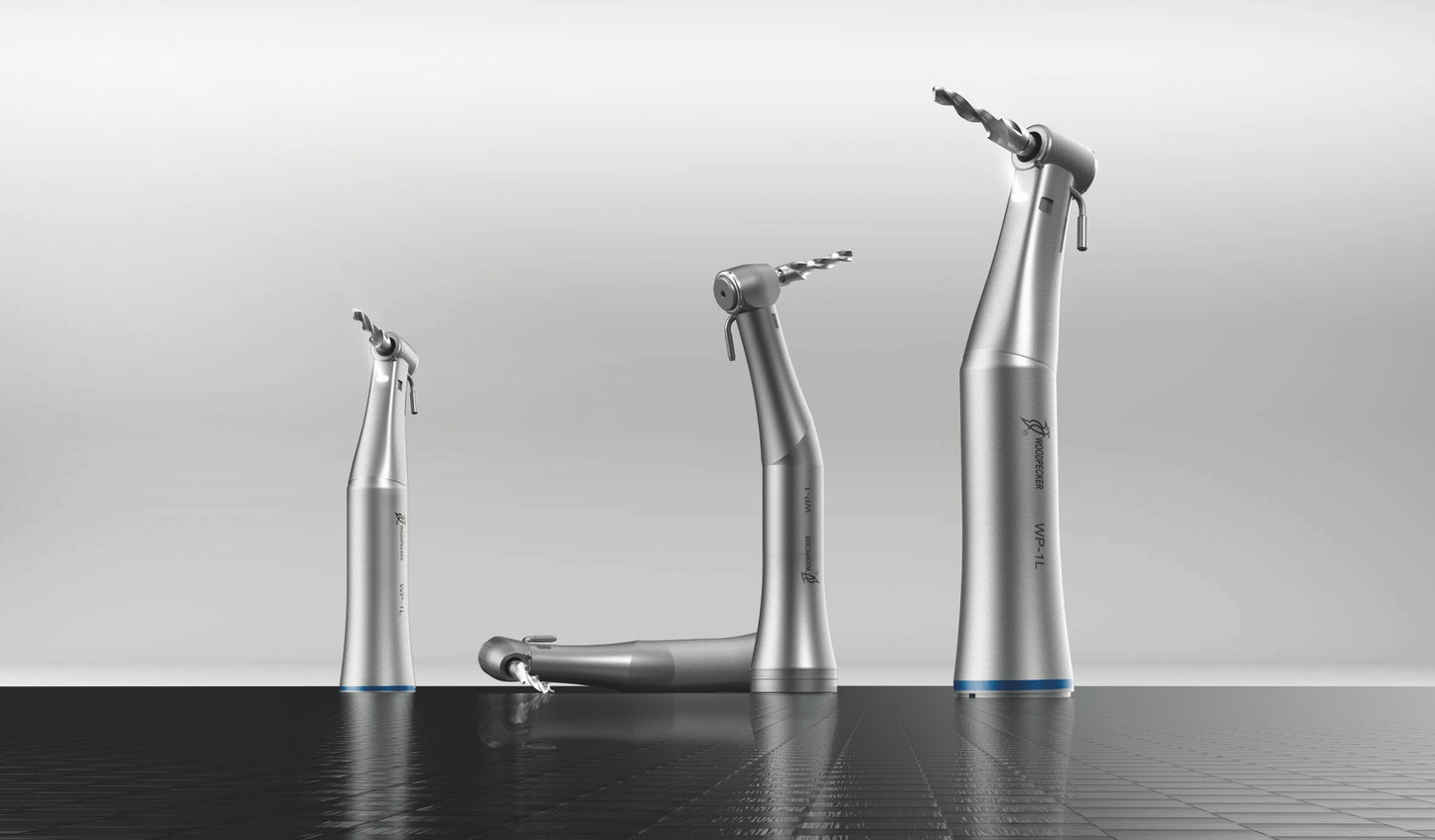 Set of Woodpecker Implanter dental handpieces with contra-angle design and implant drills. Engineered for precision implant placement, these ergonomic handpieces ensure stability, torque control, and enhanced surgical accuracy for various implant procedures.