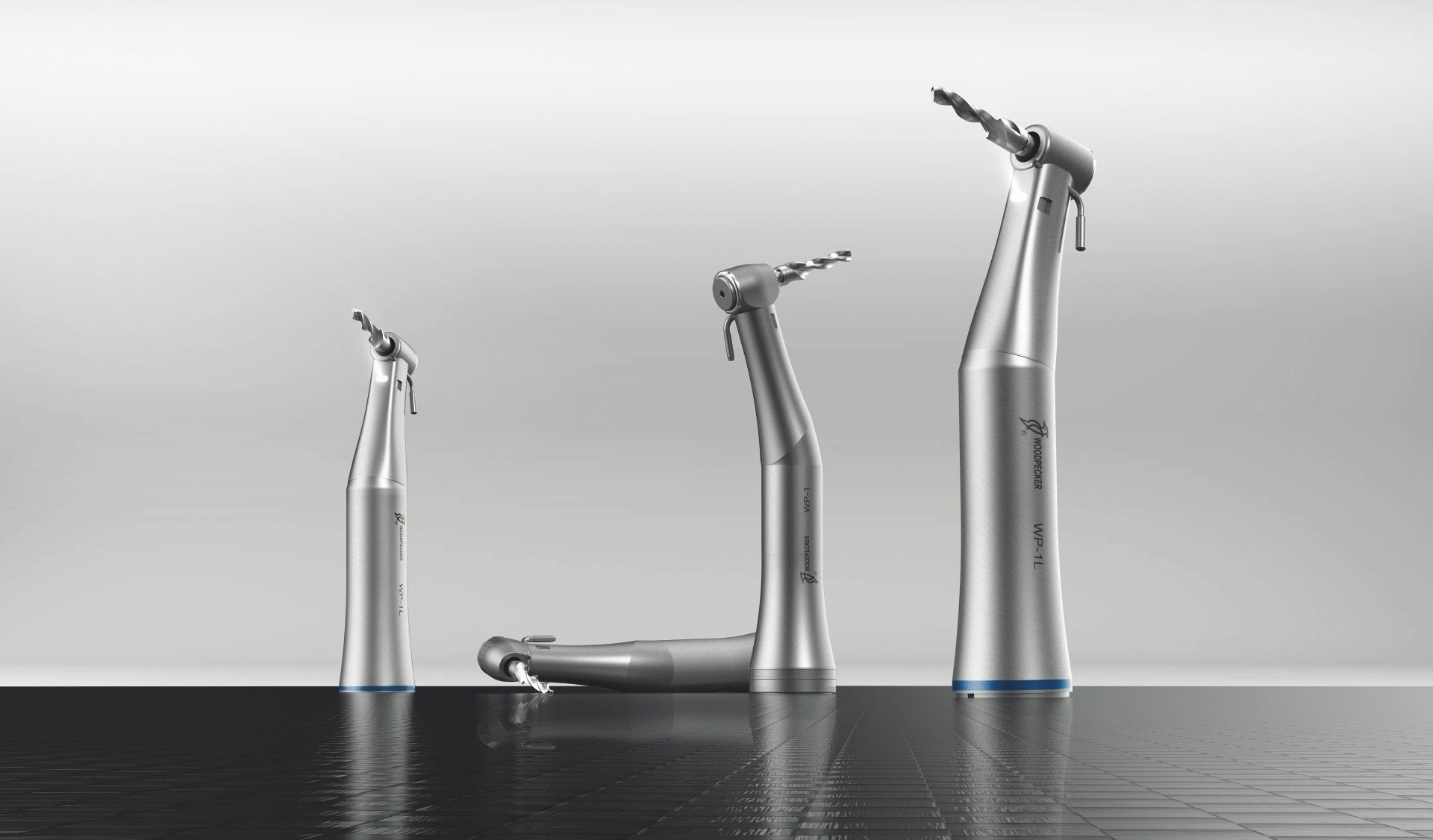 Set of Woodpecker Implanter dental handpieces with contra-angle design and implant drills. Engineered for precision implant placement, these ergonomic handpieces ensure stability, torque control, and enhanced surgical accuracy for various implant procedures.