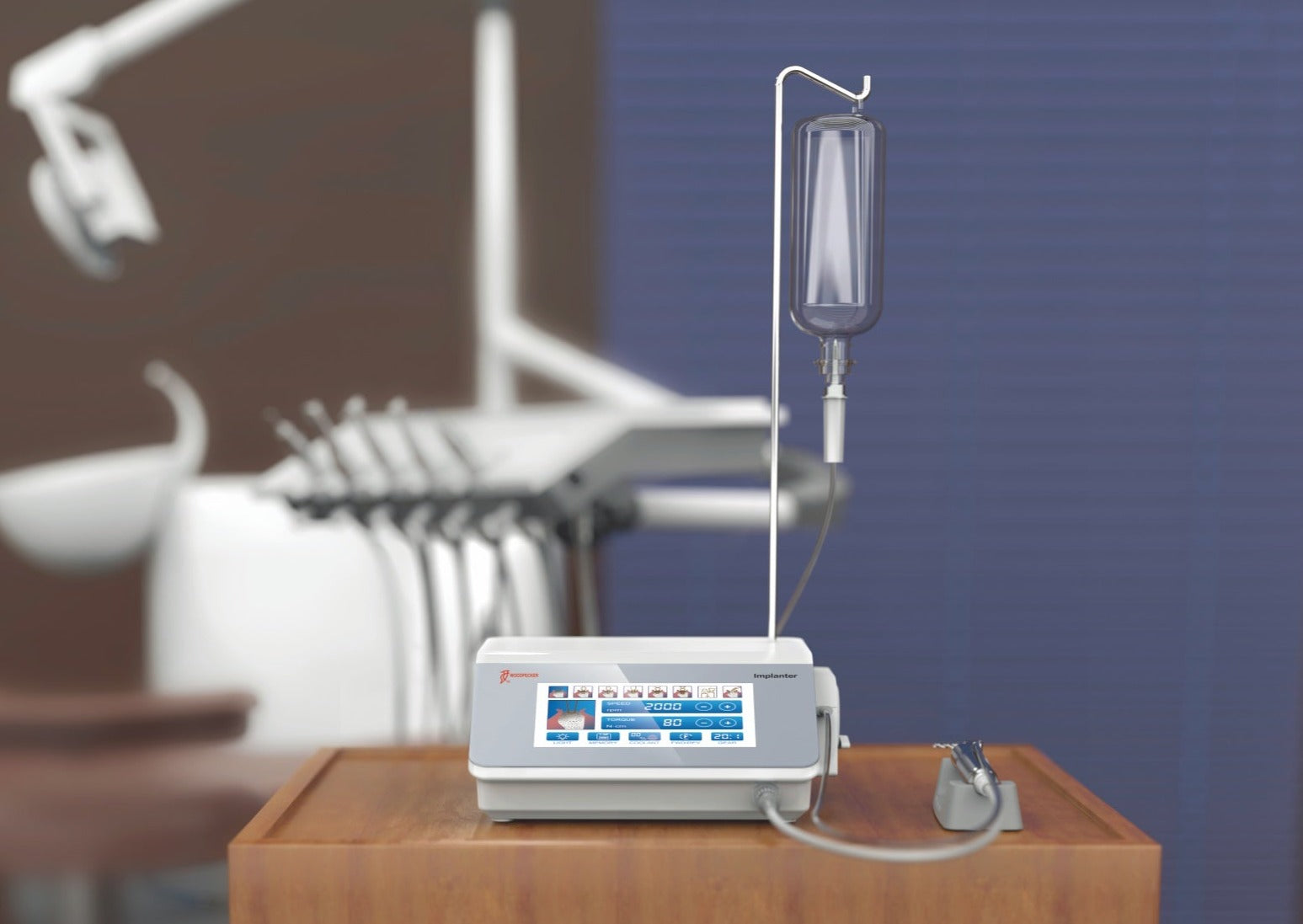 Woodpecker Implanter dental implant motor with a high-resolution touchscreen interface, an ergonomic handpiece, a transparent irrigation bottle, and a foot pedal. Designed for precise implant placement, bone drilling, and sinus lifting with a silent peristaltic pump for smooth operation.