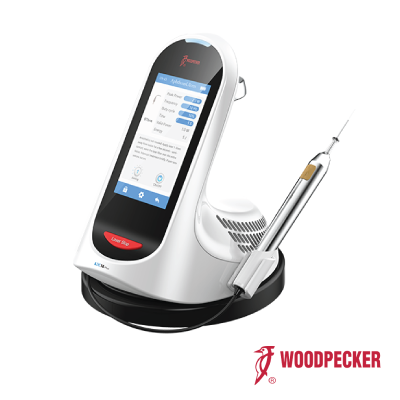 Close-up of the Woodpecker LX16 Plus soft tissue dental laser device with a high-resolution touchscreen interface showing treatment settings. The ergonomic laser handpiece is attached to the docking station, designed for precision in soft tissue procedures such as periodontal therapy and oral surgery. The Woodpecker logo is visible on the lower right corner, reinforcing the brand’s commitment to high-quality laser dentistry solutions.
