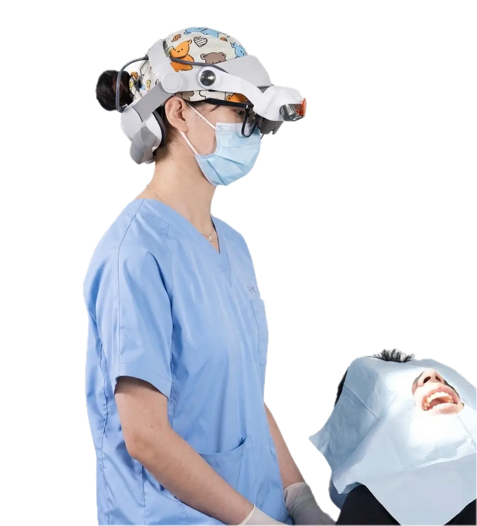 Dentist wearing arLoupe WS3509 wireless digital loupe during dental procedure